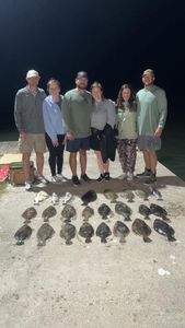 A group of 6 people fishing in Port O'Connor
