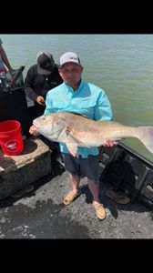 Angler holding a 26-inch fish in TX
