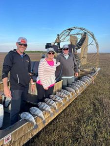 Three people fishing in texas