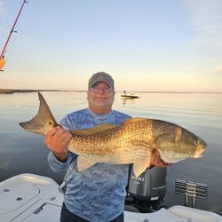 Trophy redfish on calm waters