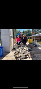 Group of six people fishing in LA