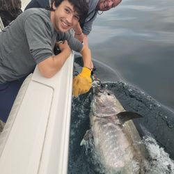 Two people fishing in MA