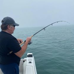 Angler with a 27-inch fish in Orleans