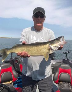 Angler holding a 24-inch fish in Beulah