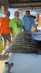 Three people fishing at ND location