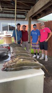 Four people fishing in Beulah