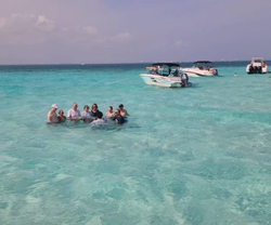 Person enjoying water sports at Rum Point