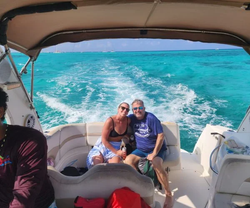 Two people enjoying water sports at Rum Point