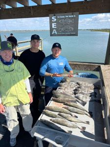 Three people fishing in Corpus Christi