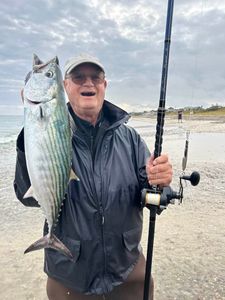 Master surf casting Cape Cod beaches.