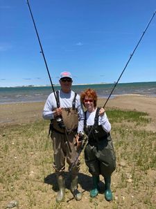 Two people fishing in MA