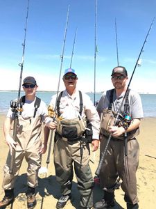 Three people fishing in MA