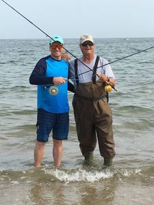 Two people fishing at East Sandwich