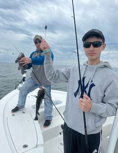 Two anglers with a big fish caught in SC
