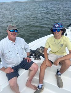 Two people fishing in SC