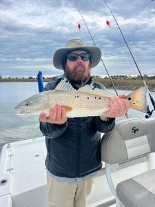 Angler with 18-inch fish in Mount Pleasant