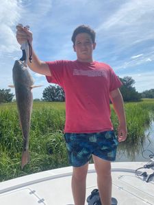 Angler with a big fish at Mount Pleasant