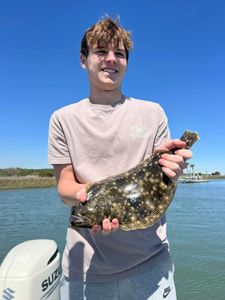 A Southern Flounder, a 12-inch fish, caught while fishing in Mount Pleasant