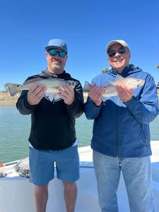 Two redfish caught during a fishing trip in Mount Pleasant