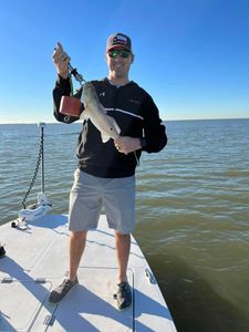 A person fishing in TX