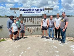 Group of 8 people fishing in TX