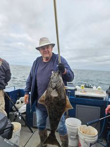 Large Pacific halibut caught on fishing charter boat near Reedsport Oregon
