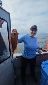 Fishing trip near Reedsport OR showing caught fish on boat deck