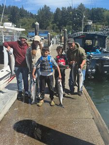 Four chinook salmon and coho salmon caught in Reedsport