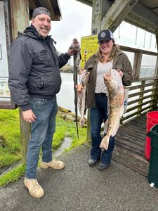 Two anglers fishing at Reedsport
