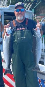 Two Coho Salmon and Chinook Salmon caught while fishing in OR