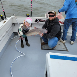 Angler catching a large blue catfish in Baltimore