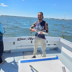 Striped bass caught during fishing charter in Baltimore MD waters