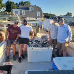 4 people enjoying a cruises and fishing trip in Baltimore