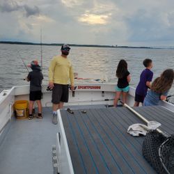 Two people enjoying a cruise and fishing trip in Baltimore