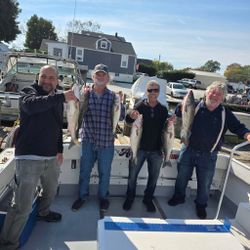Striped bass fishing in MD with 5 people