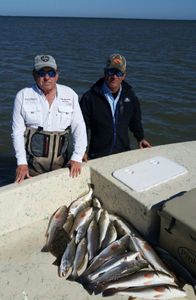 Two people fishing in Port O'Connor