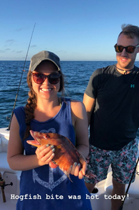Two people fishing at Madeira Beach