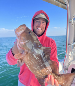 A person fishing at Madeira Beach