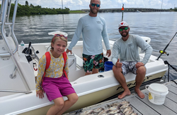 Three people fishing in Florida waters