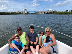 A group of 5 people fishing in FL