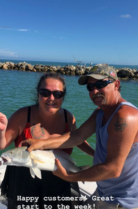two anglers fishing on the beach at Madeira Beach