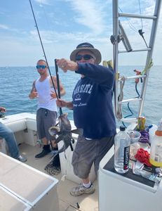 A couple of people fishing in NJ