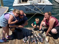 4 people in Neptune City, fishing