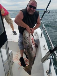 Lone fisherman reeling in catch in NJ