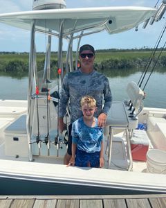 Two people fishing on Tybee Island