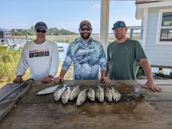 Three people fishing on Tybee Island