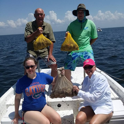 Four people fishing at Homosassa