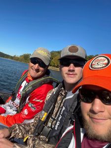 Three people enjoying water sports and fishing cruises in Harned