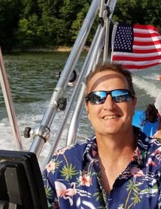Person enjoying water sports activities in KY