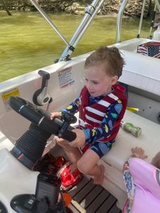 Person enjoying cruises, fishing, tours, and water sports in Harned